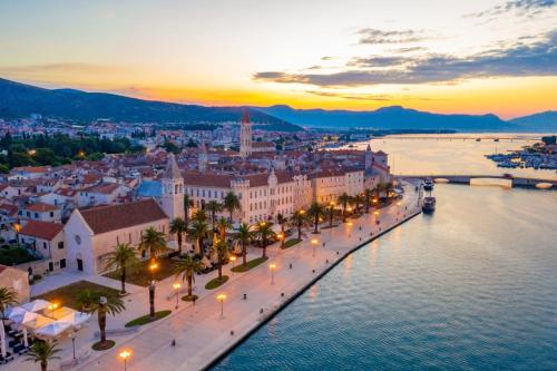 an aerial view of a city with a river at Argola in Trogir