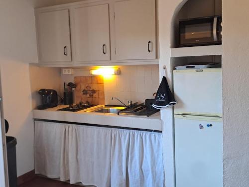Kuchyň nebo kuchyňský kout v ubytování Appartement T2