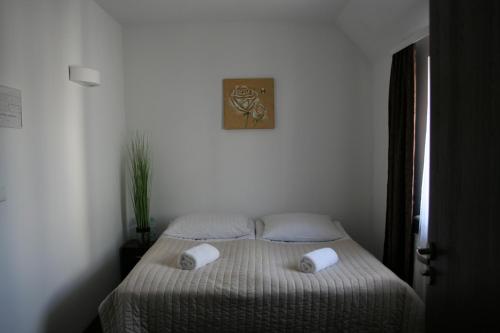 Posteľ alebo postele v izbe v ubytovaní Hotel Junior 2