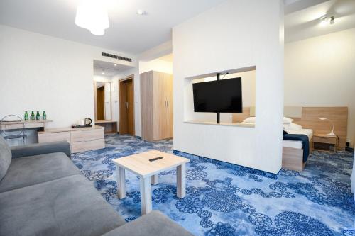 TV a/nebo společenská místnost v ubytování Hotel Zacisze