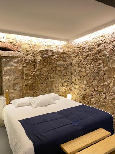 Ένα ή περισσότερα κρεβάτια σε δωμάτιο στο Casa dos Monges by PURUS