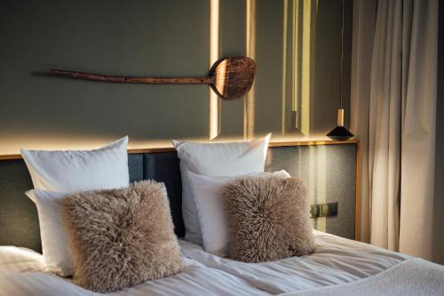 Letto o letti in una camera di Balvanyos Resort - Peakture Hotel & Grand Hotel Balvanyos