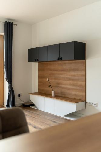 a living room with a couch and a table at Andrea 's 4 seasons in Albrechtice v Jizerských horách
