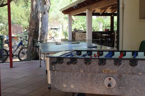 Stolní tenis v ubytování Village Camping Fico D'India nebo okolí