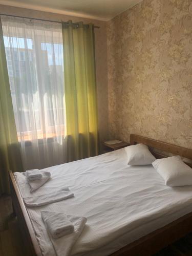 Postel nebo postele na pokoji v ubytování Hotel Resttime