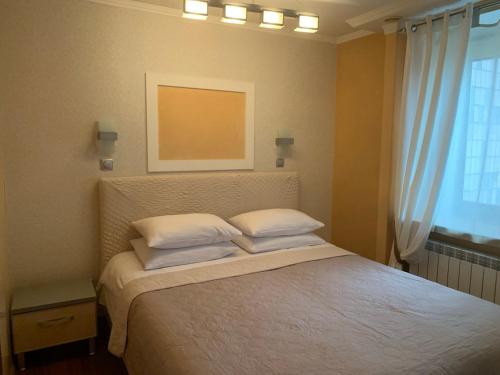 Кровать или кровати в номере Apartaments Teris