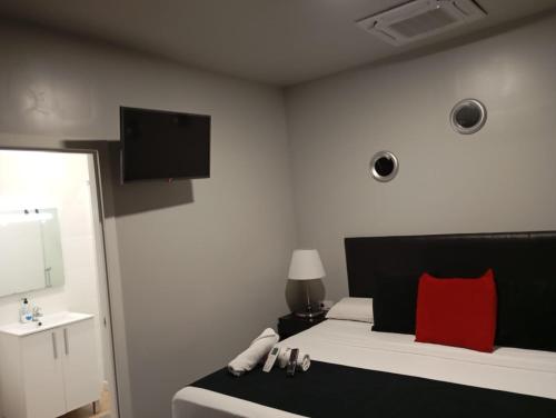 Postel nebo postele na pokoji v ubytování Apartamentos Rous - Solo adultos