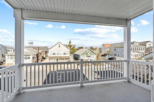 a view from the balcony of a house at Brand New Luxury Home with Rooftop Water Views in Seaside Heights