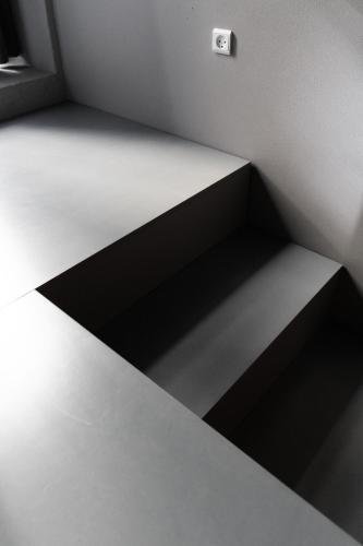 a black and white room with a shelf at Roberta's Society Aarhus in Aarhus
