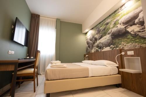 Postel nebo postele na pokoji v ubytování Mathera Boutique