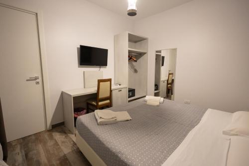 Postel nebo postele na pokoji v ubytování Mathera Boutique