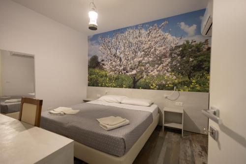Postel nebo postele na pokoji v ubytování Mathera Boutique