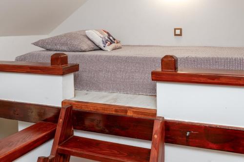 En eller flere senge i et værelse på Story Stone House