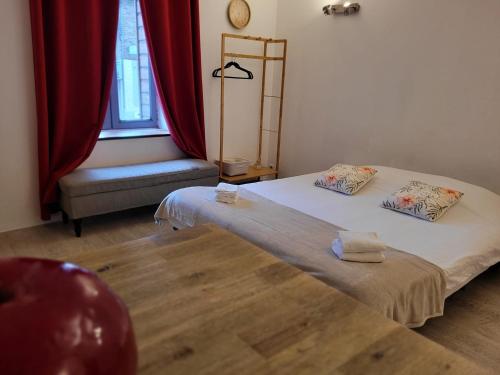 Postel nebo postele na pokoji v ubytování Résidence le 09