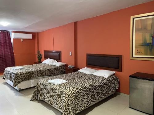 Katil atau katil-katil dalam bilik di Hotel Perú Hosting - Piura