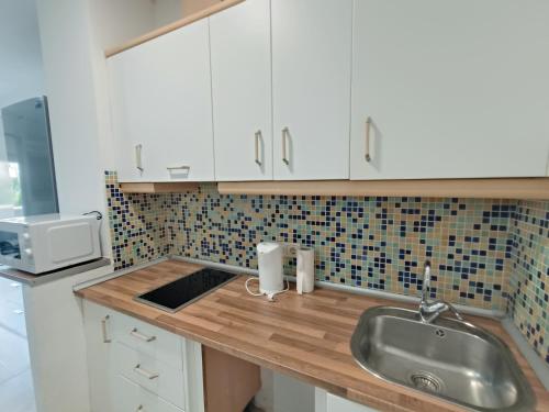 "VIVE BENAL BEACH" estudio 3124 con parque acuático, primera linea de playa