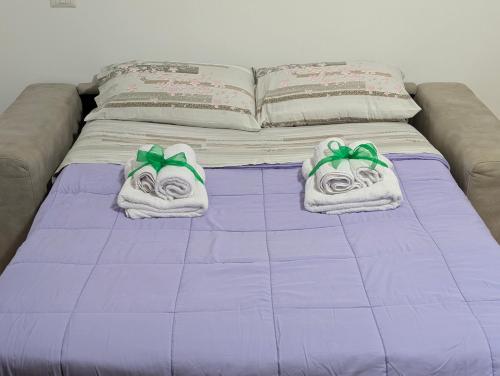 Ένα ή περισσότερα κρεβάτια σε δωμάτιο στο CVR casa vacanze Roma
