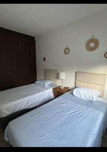 Ένα ή περισσότερα κρεβάτια σε δωμάτιο στο Casa Nogal