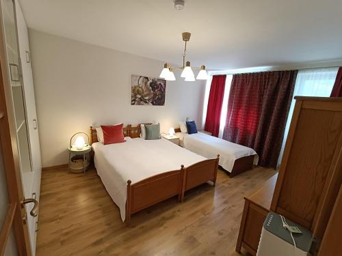 Katil atau katil-katil dalam bilik di Cozy apartment