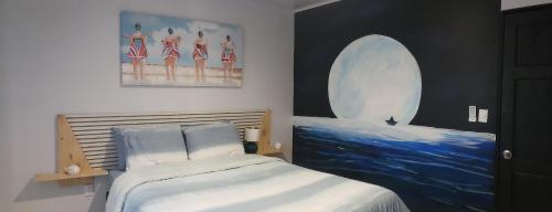 Postel nebo postele na pokoji v ubytování Aqua Heaven