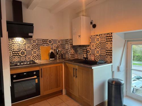 Η κουζίνα ή μικρή κουζίνα στο Le trente 30