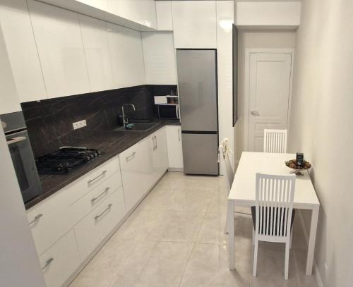 Cuina o zona de cuina de Black & White Apartment