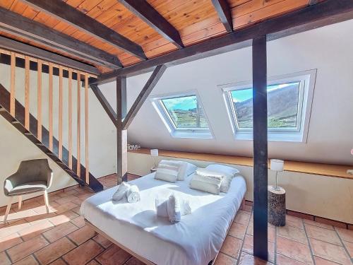 Postel nebo postele na pokoji v ubytování La Belle Étape, Appartement avec Piscine et Spa