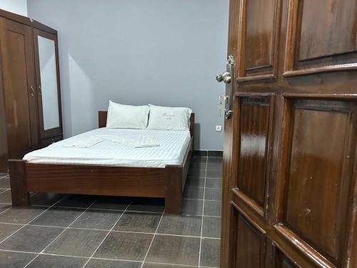 Ένα ή περισσότερα κρεβάτια σε δωμάτιο στο Ranzol Hotel and Guest House