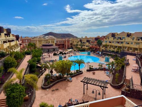 Prime Las Americas Getaway - Apartment with Huge Private Terrace & Pool Access