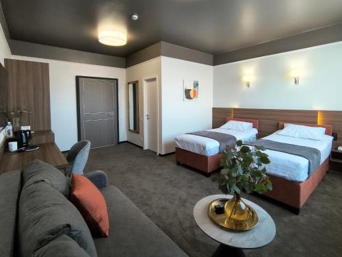Postel nebo postele na pokoji v ubytování Mini Hotel on Brovarskaya