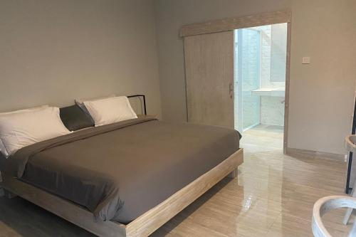 Katil atau katil-katil dalam bilik di Gemini Star Hotel Kuta