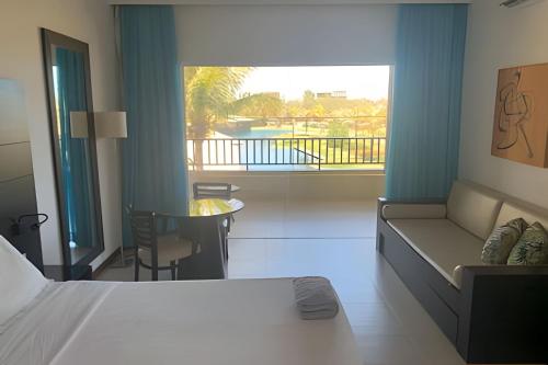 En eller flere senge i et værelse på Apartamento em Fortaleza - CE