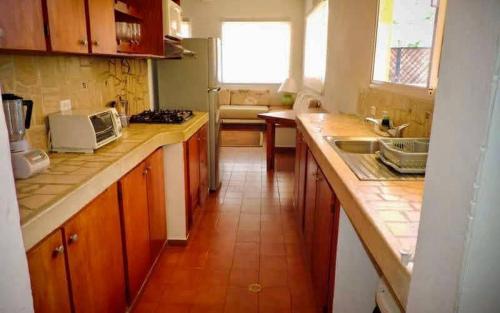 Dapur atau dapur kecil di Tu refugio tropical en Morrocoy