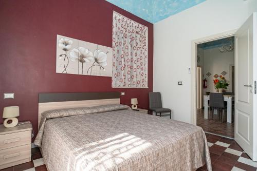 Ένα ή περισσότερα κρεβάτια σε δωμάτιο στο Casa Ciumifriddu