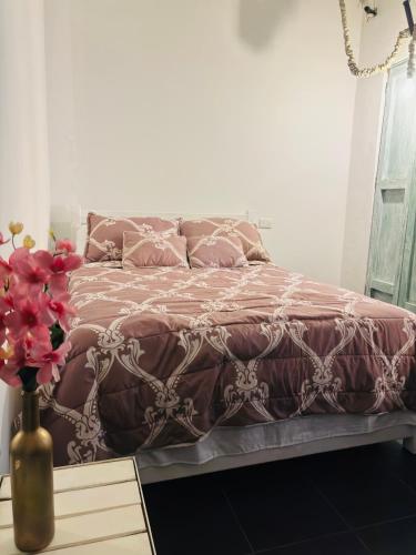 Postel nebo postele na pokoji v ubytování Hotel La Casa Ovalle