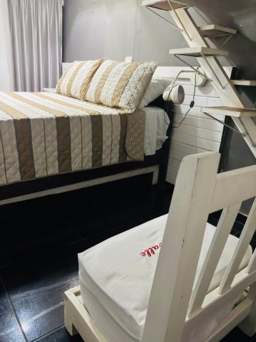 Postel nebo postele na pokoji v ubytování Hotel La Casa Ovalle