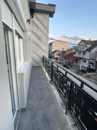 a balcony with a view of a city at Vila Mila Ćirić in Pančevo