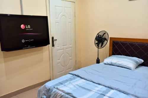 Кровать или кровати в номере Tasteful 5 bedroom , 2 kitchen, 2 living-room