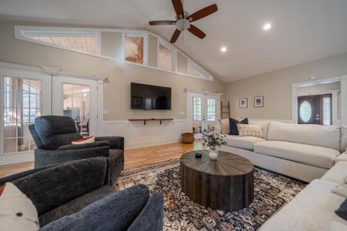 a living room with a couch and a table at Whiskey Way Inn in Candler
