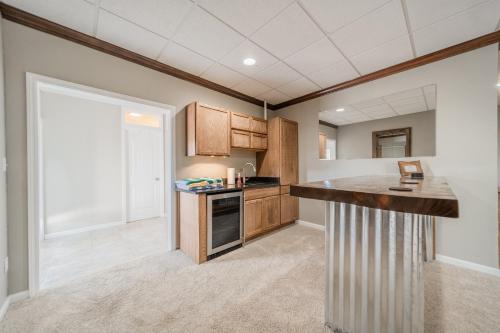 a kitchen with a counter and a counter top at Whiskey Way Inn in Candler