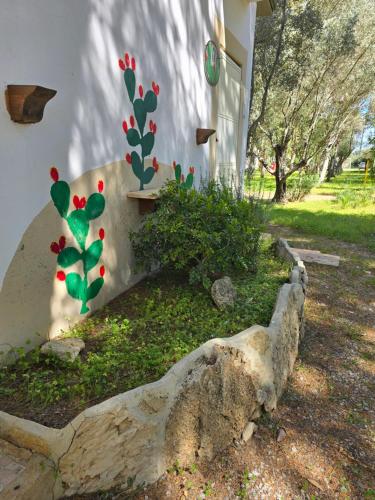 Κήπος έξω από το Village Camping Fico D'India