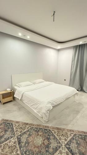 เตียงในห้องที่ المسك للوحدات الفندقيه الفاخره