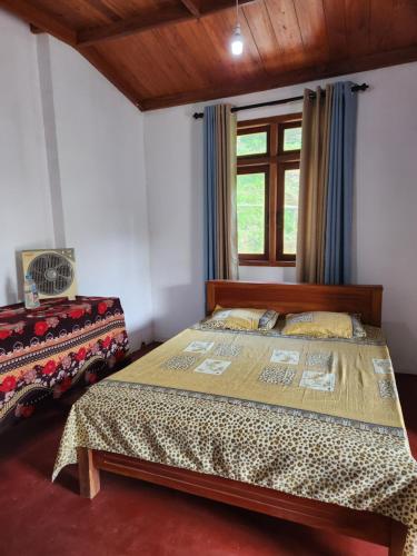Postel nebo postele na pokoji v ubytování Silvil Homestay
