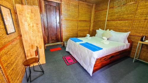 Cama o camas de una habitación en Europe Enchanted Bungalow Koh Rong
