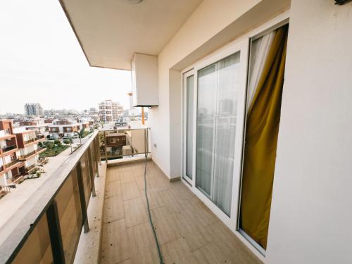an apartment balcony with a view of a city at Luxury studio, Iskele, Cyprus in Iskele