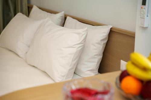 Postel nebo postele na pokoji v ubytování Celo Apartments