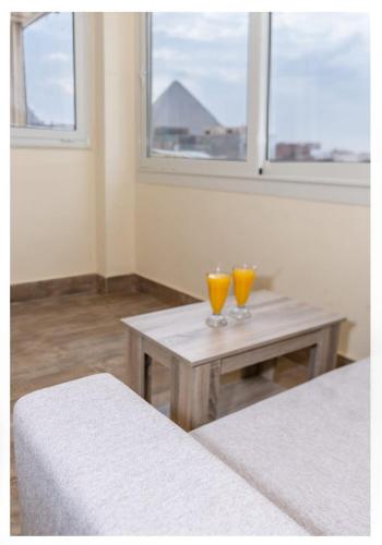 Hassan Pyramids Hotel&Rooftopにあるベッド