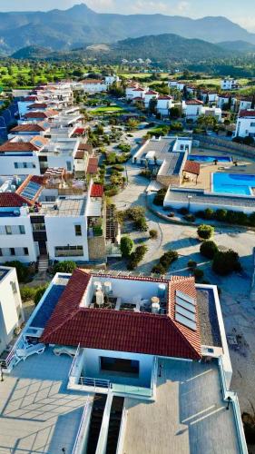 an aerial view of a city with many buildings at Boho Bay Apartment in Akanthou
