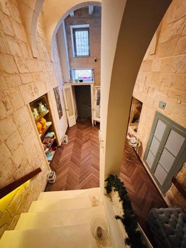 a view of a hallway of a house with a staircase at Casa Cara in Birgu