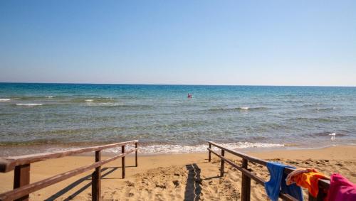 a towel is hanging on a fence on the beach at Luxury studio, Iskele, Cyprus in Iskele